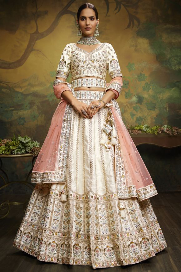 Off White Color Silk Fabric Heavy Embroidered Bridal Look Designer Lehenga  Choli